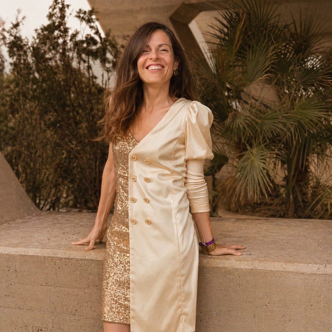 María Arcos Álvarez, creadora de Delinuts, sonriendo al aire libre